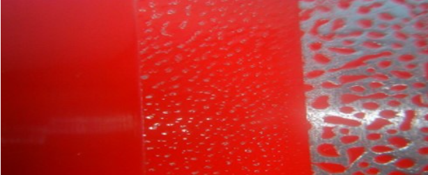 Examples of how different levels of leveling agent coating additives impact wetting process across a paint film surface